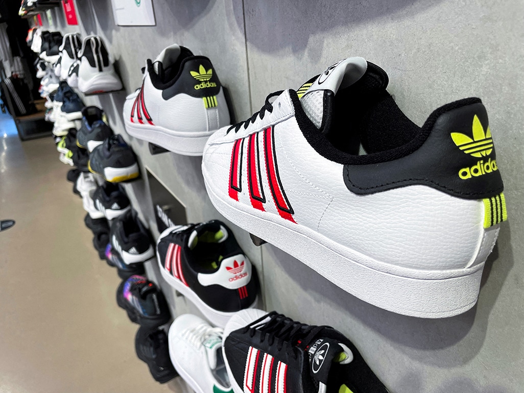 Adidas posts first loss in 30 years