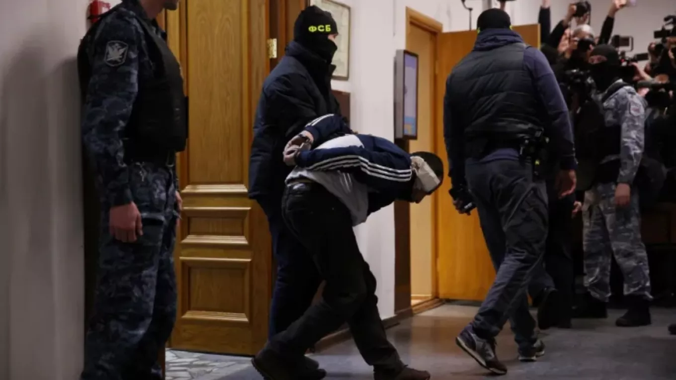 Missile debris falls in Kyiv, building badly damaged, say Ukrainian officials