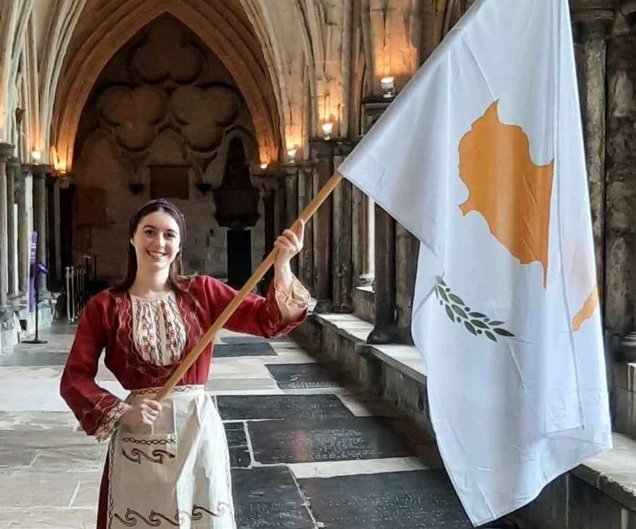 Phoebe Coles bears Cyprus flag at Commonwealth Day