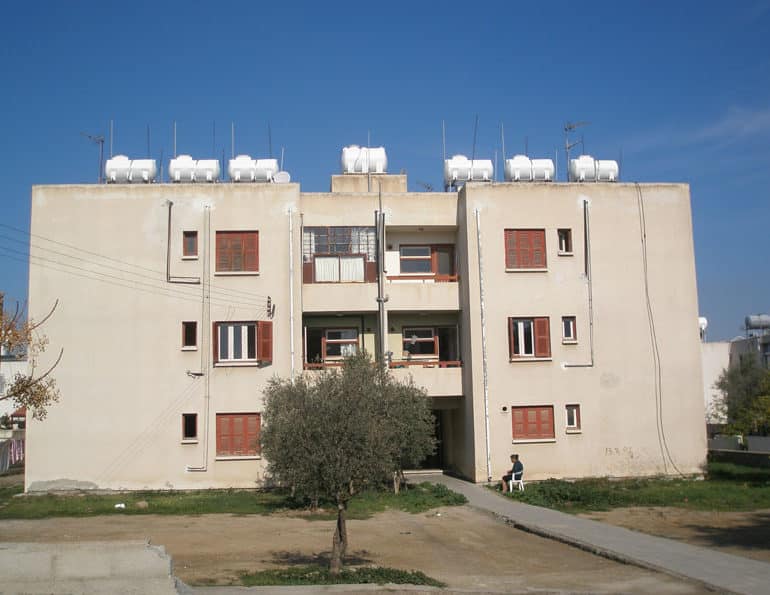 Refugees living in unsafe buildings for over 20 years