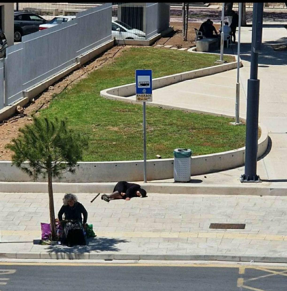 Fury over old woman lying on pavement at Paphos bus stop