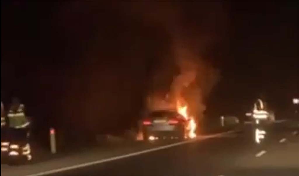 Three escape car fire